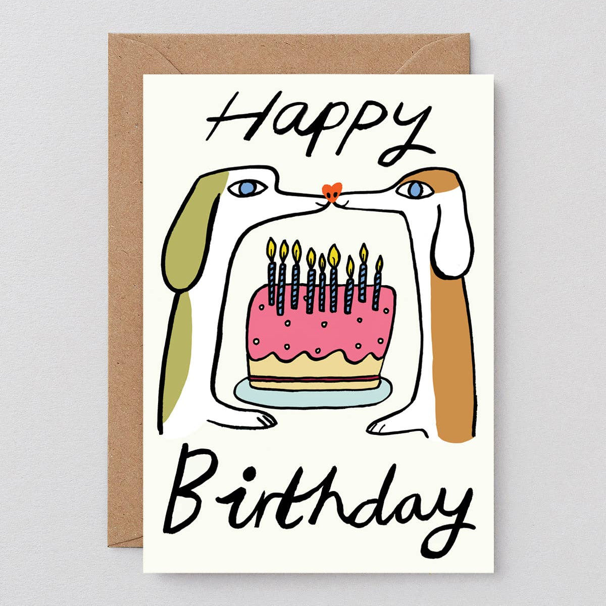 Birthday card with a dog looking at a birthday cake with candles, on a gray background.