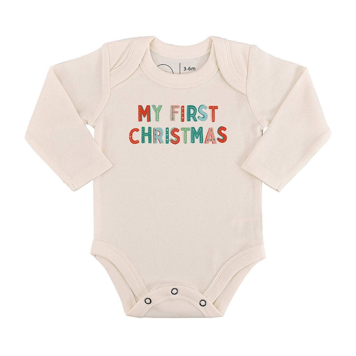 Baby onesie with 'My First Christmas' text on a white background
