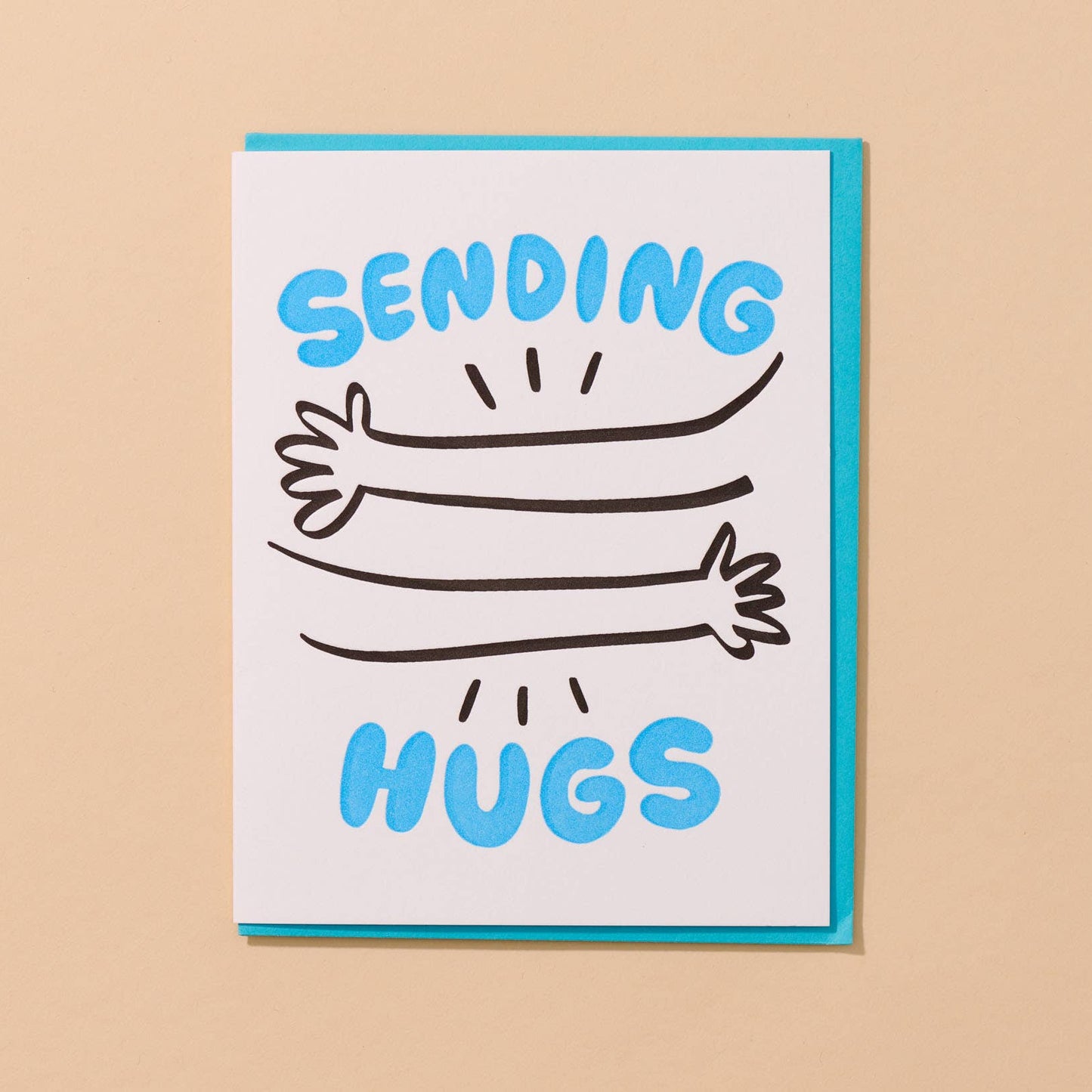 Card with 'Sending Hugs' text and hug illustrations on a beige background