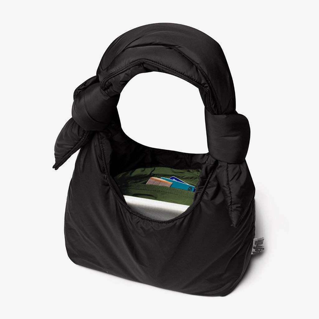 Black baby carrier with a white screen on a white background