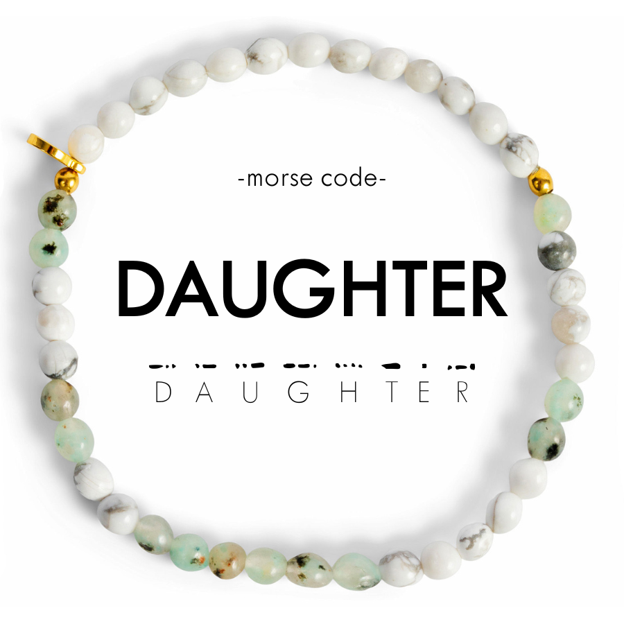 Beaded bracelet with 'DAUGHTER' in Morse code on a white background