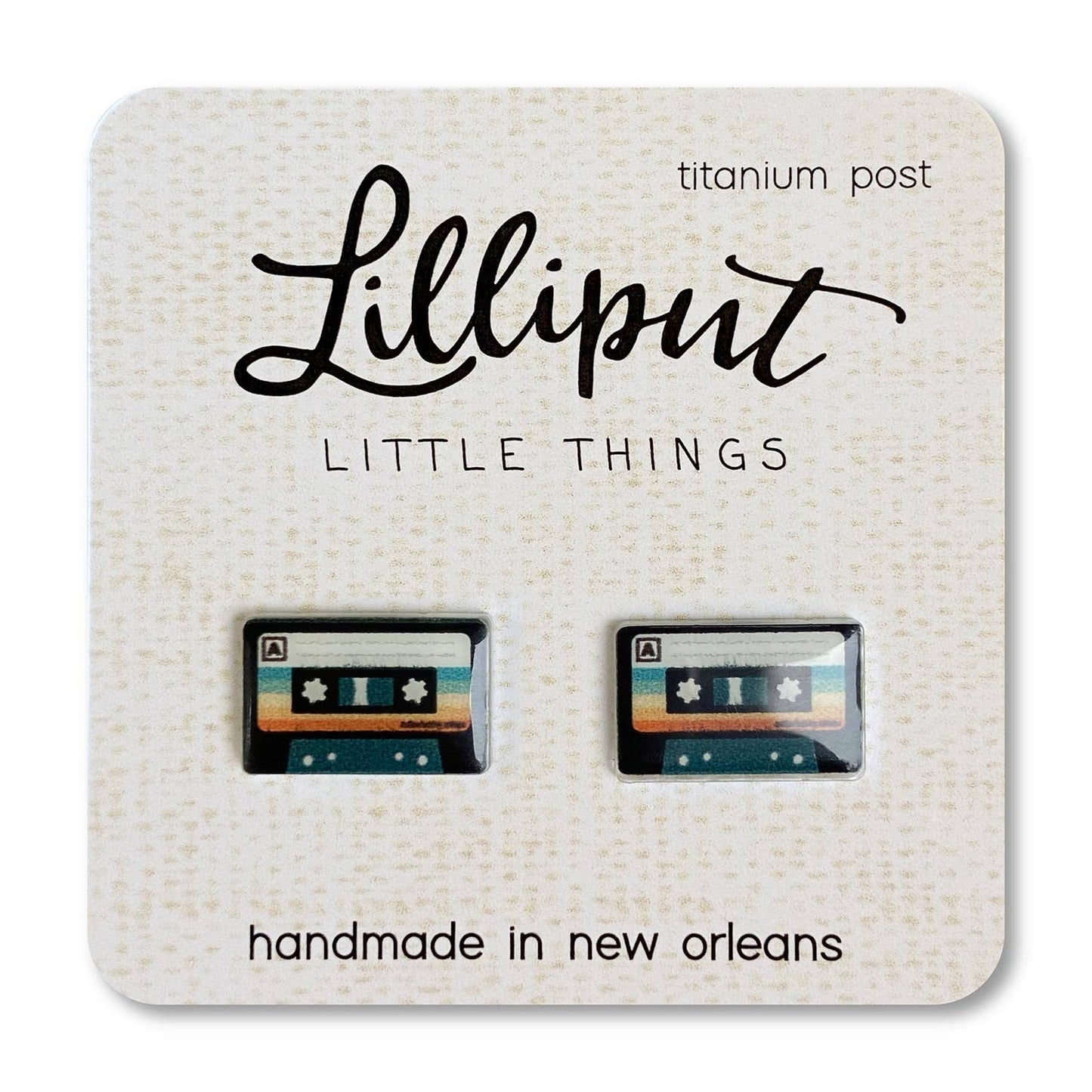 Cassette tape-shaped earrings on a Lilliput Little Things branded card.