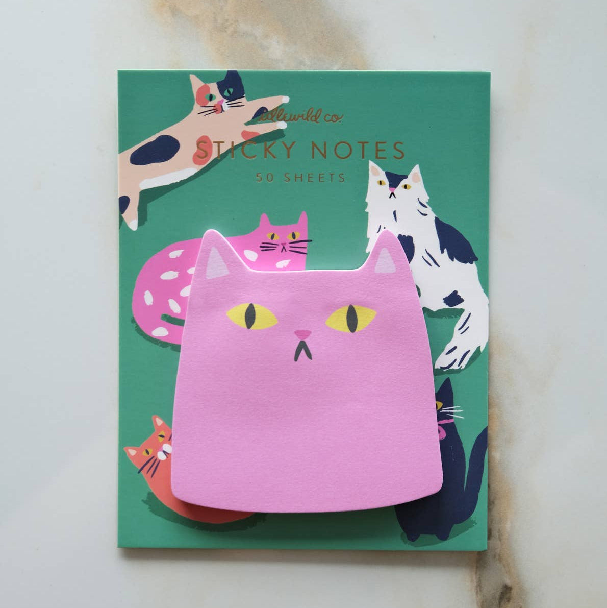 Cat-themed sticky notes on a green background