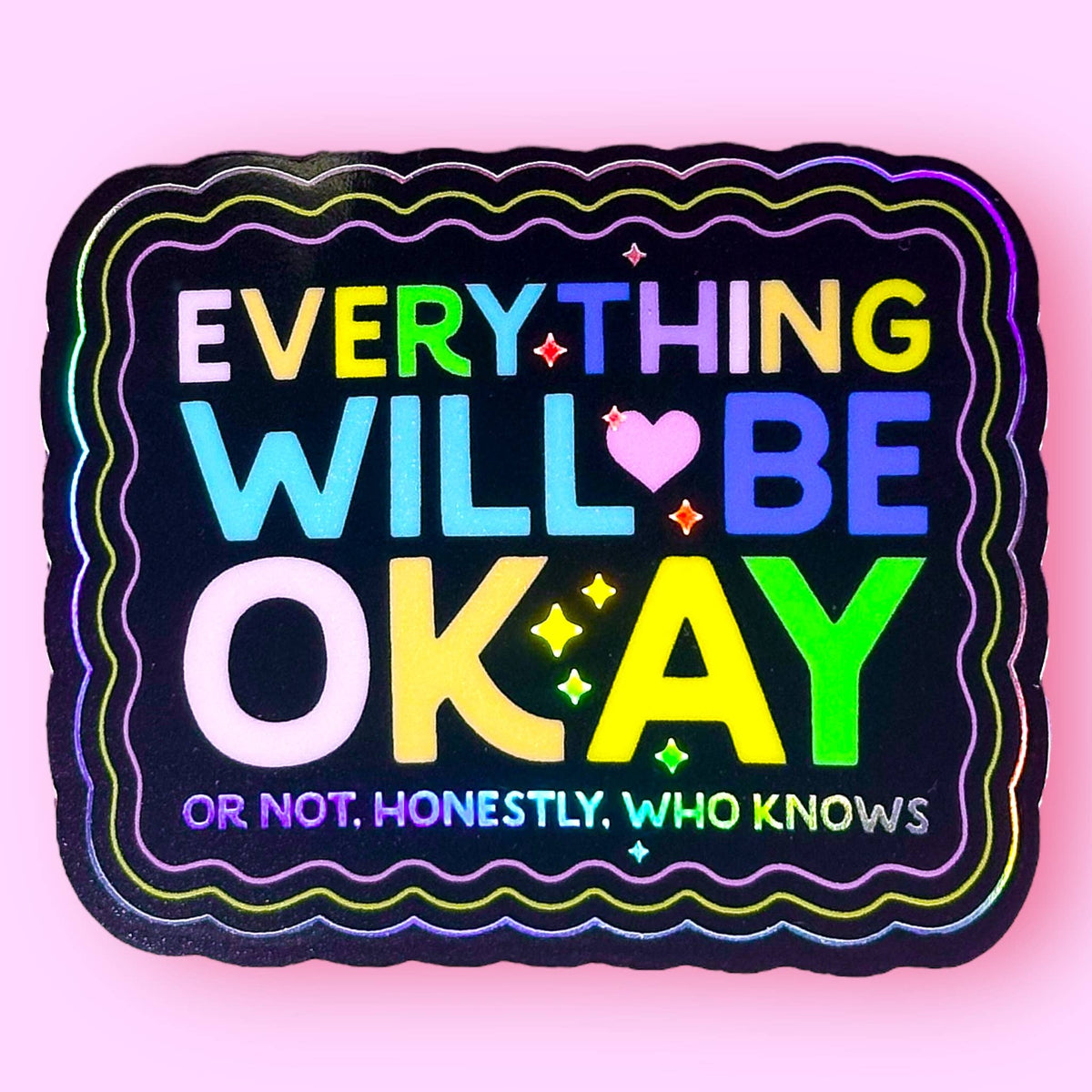Colorful motivational quote sticker with rainbow text on a pink background