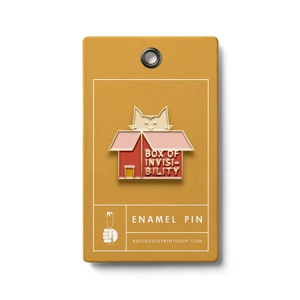 Enamel pin of a cat inside a box labeled 'Box of Invisibility' on a mustard yellow card.