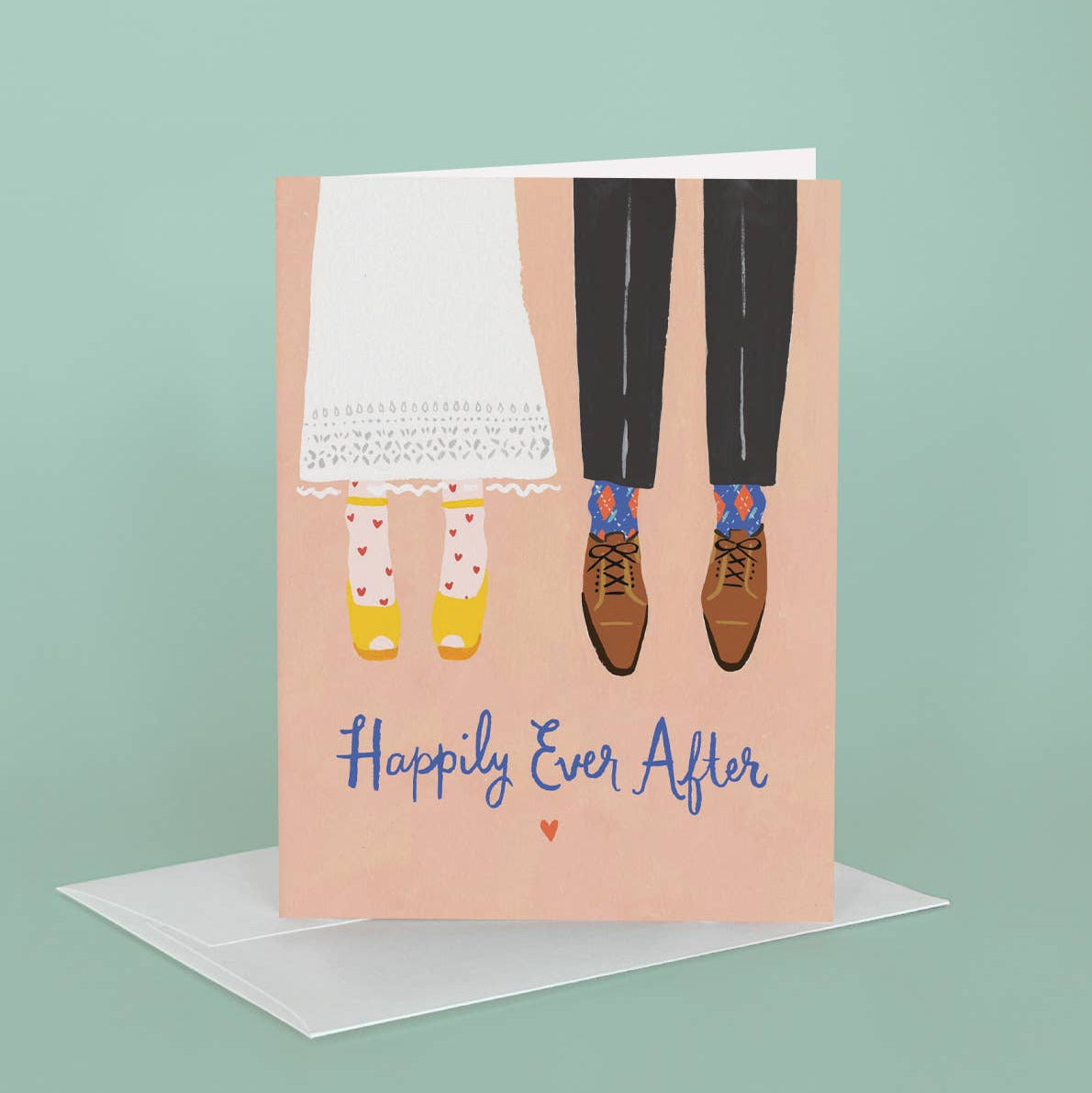 Greeting card with illustration of a couple's feet and 'Happily Ever After' text on a light green background