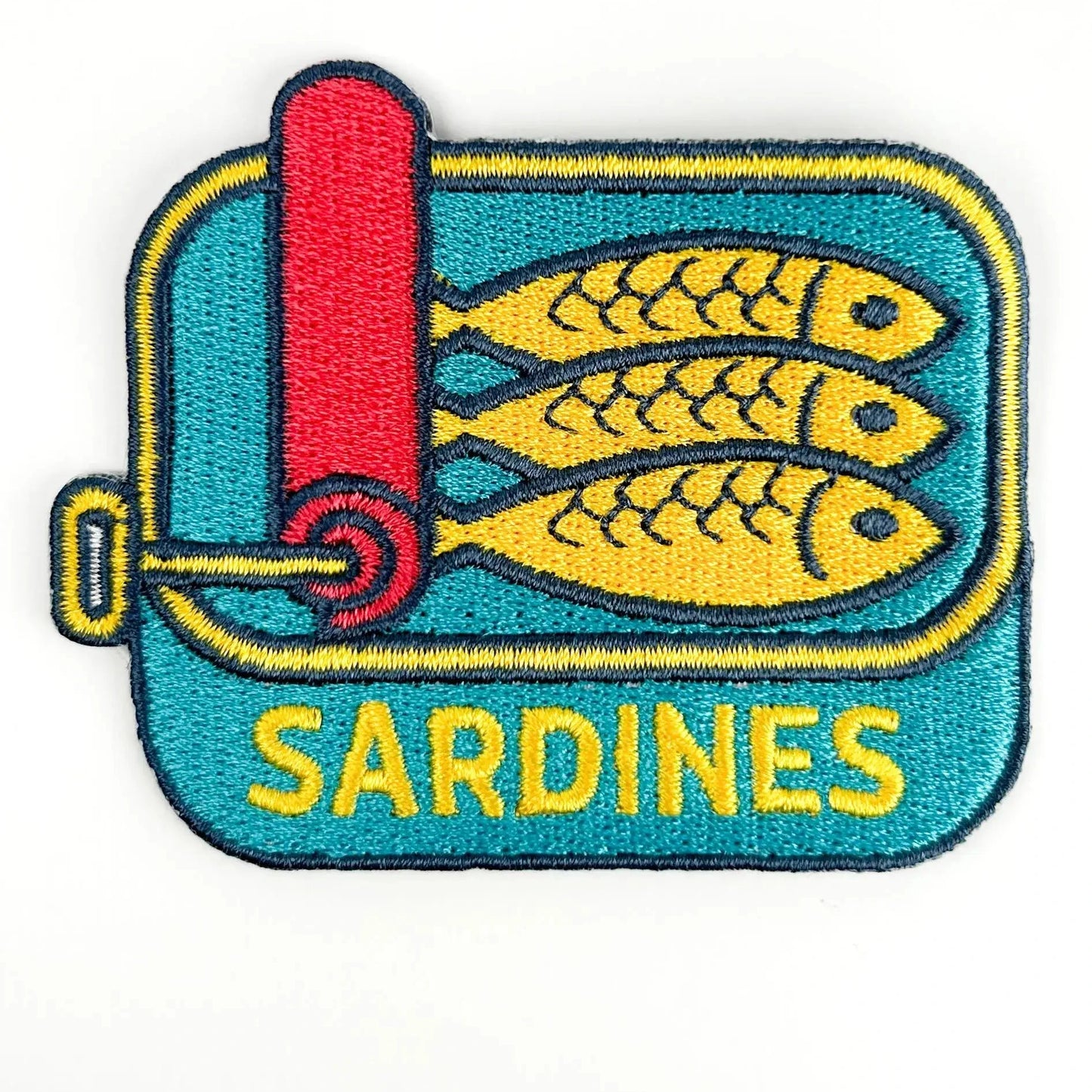 Patch of a sardine can with two yellow fish on a blue background