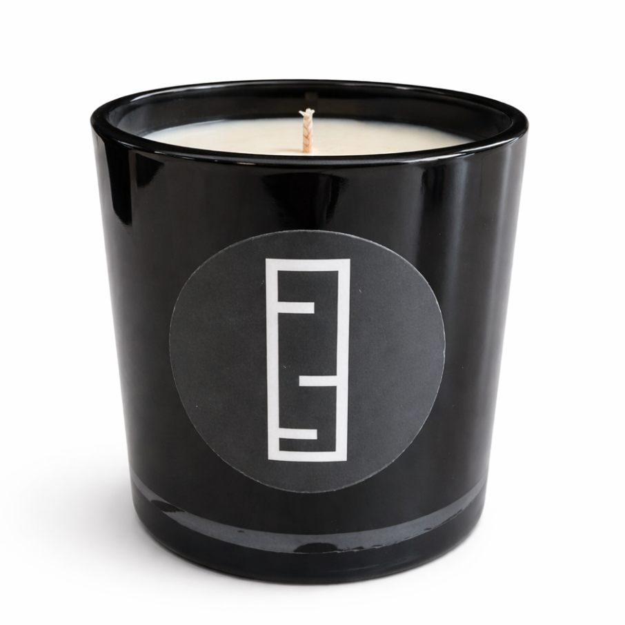 Black candle jar with a logo on a white background