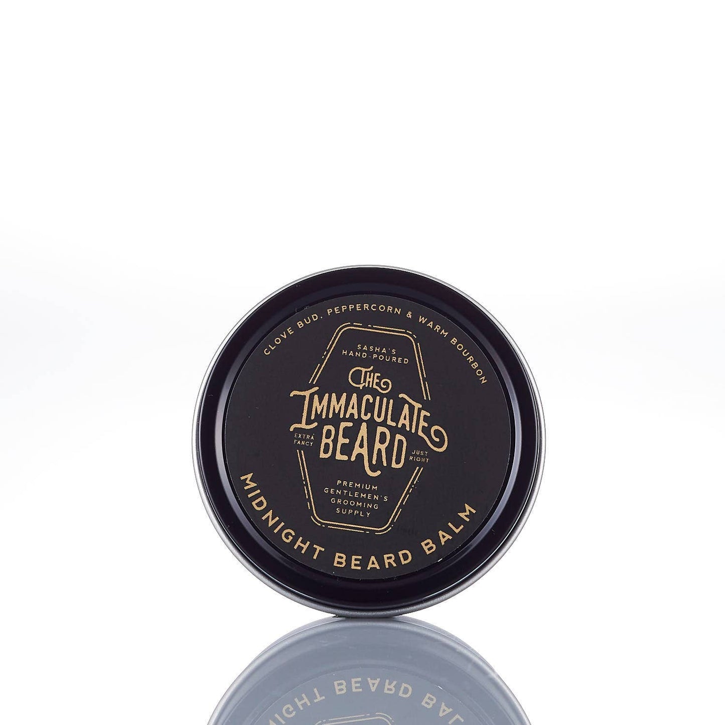Black container of 'The Immaculate Beard' midnight beard balm on a white background