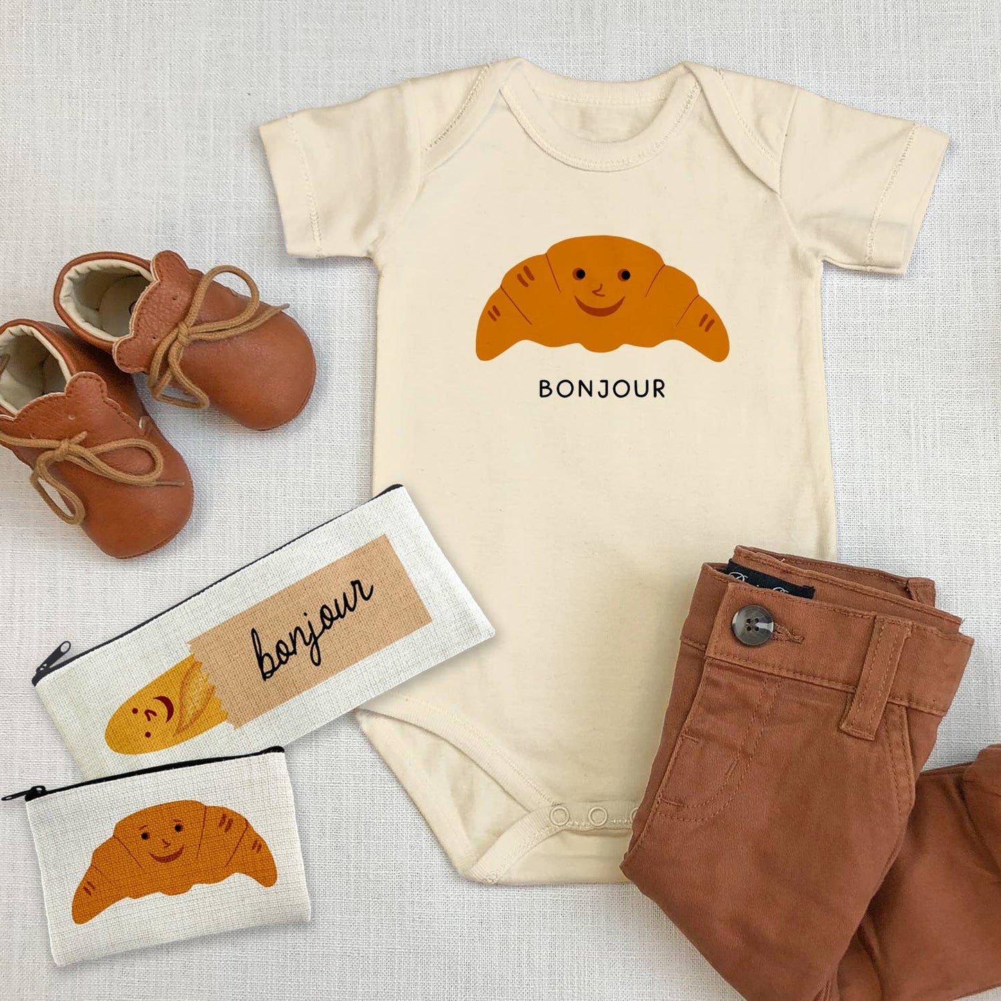 Bonjour Croissant with Cute Face Baby Bodysuit