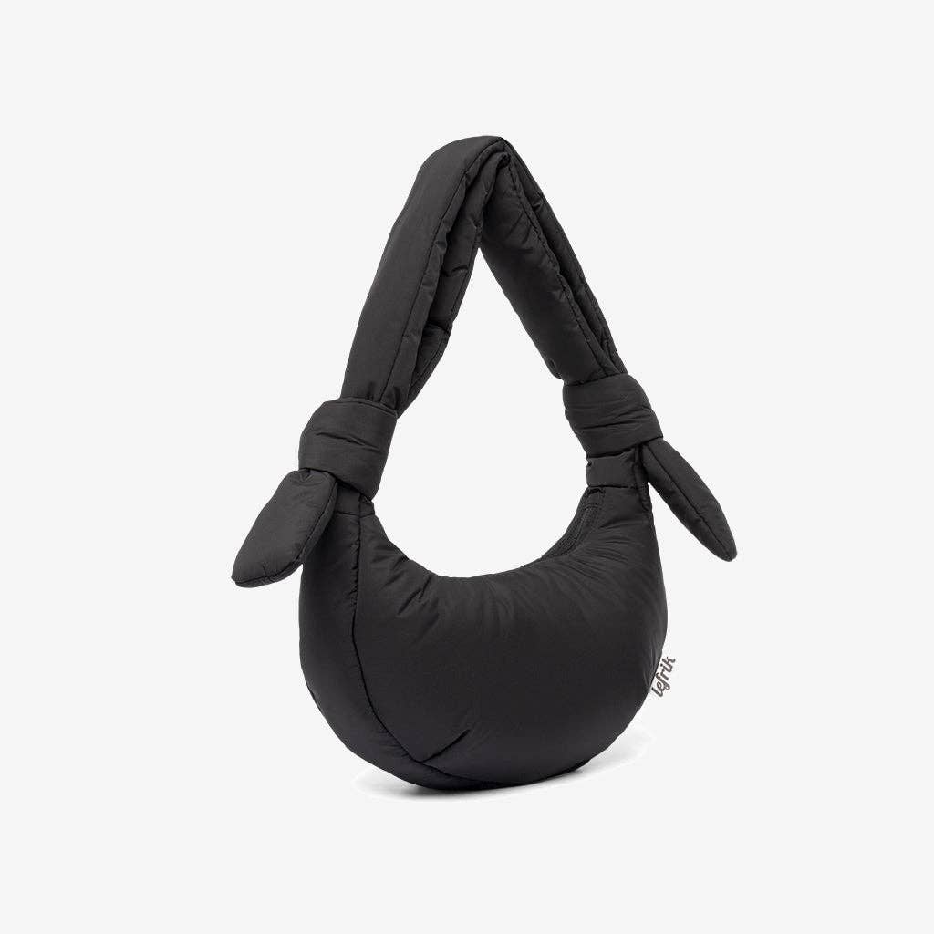 Black baby carrier with bunny ears on a white background