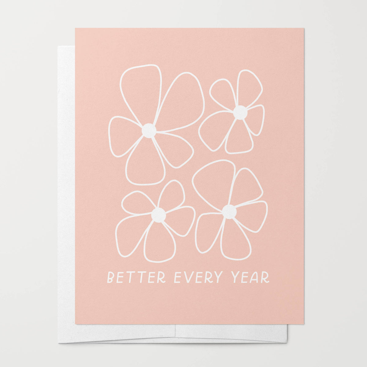 card that says the phrase 'BETTER EVERY YEAR' in white text