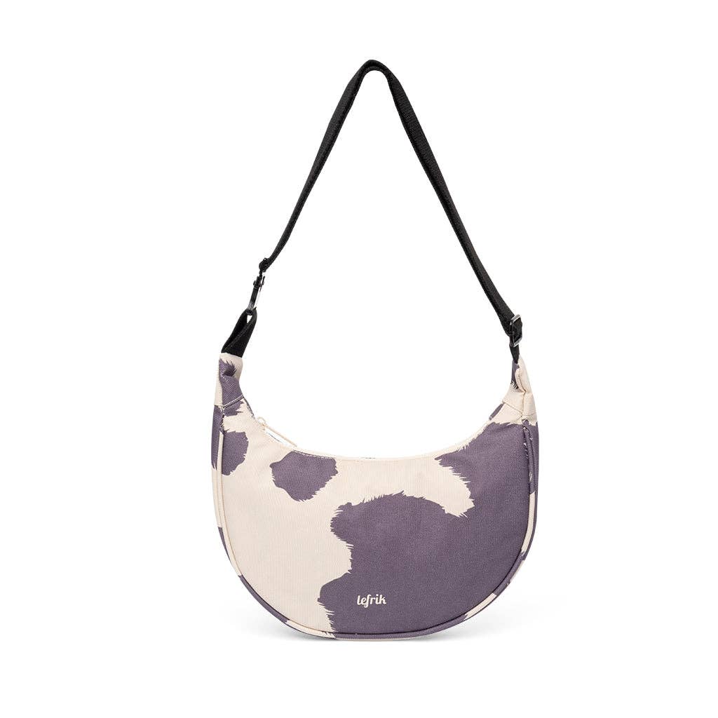 Purple and beige patterned bag with a black strap on a white background