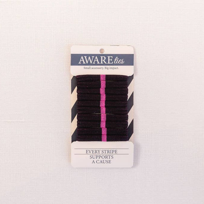 Pack of black and pink striped hair ties on a white background