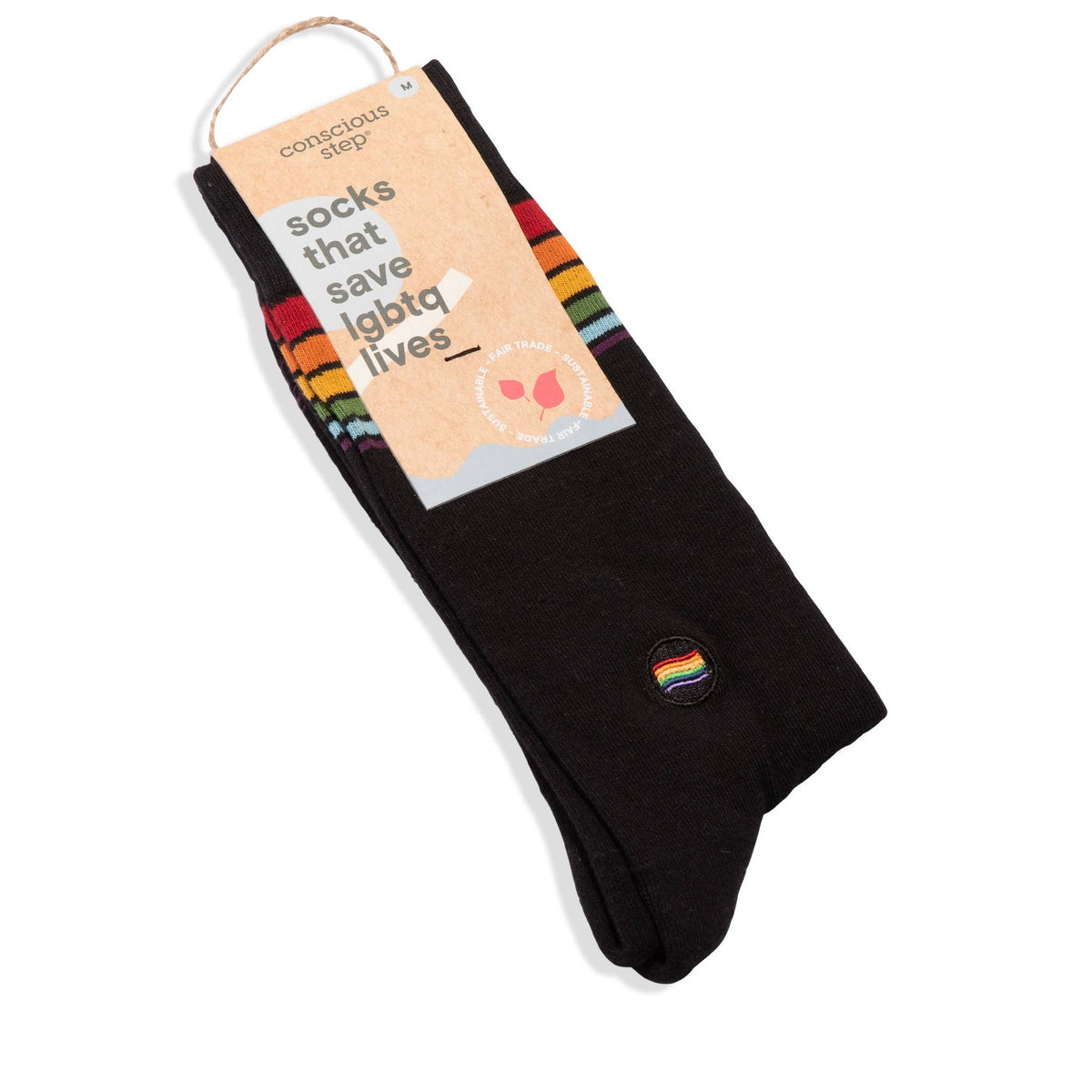 Black socks with a rainbow pride flag on packaging labeled 'conscious step' on a white background