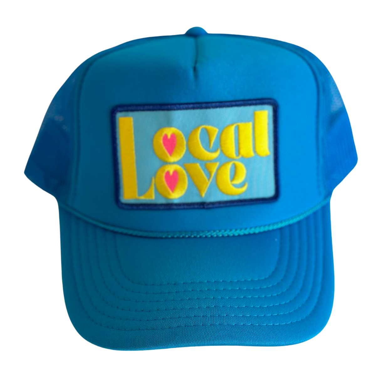 Blue cap with 'Local Love' text and heart design on a white background
