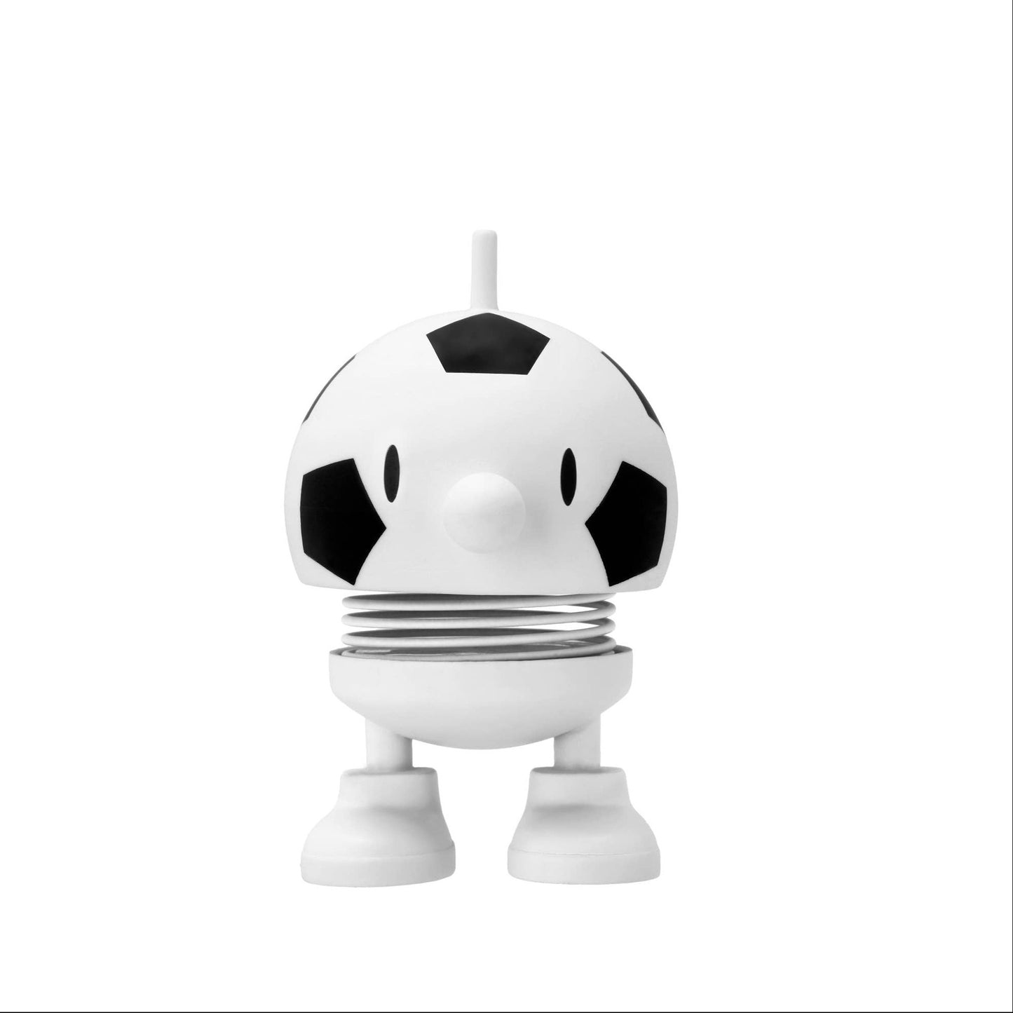 A small novelty candle shaped like a cartoonish soccer ball character with black and white panels, standing on a white base against a plain white background.