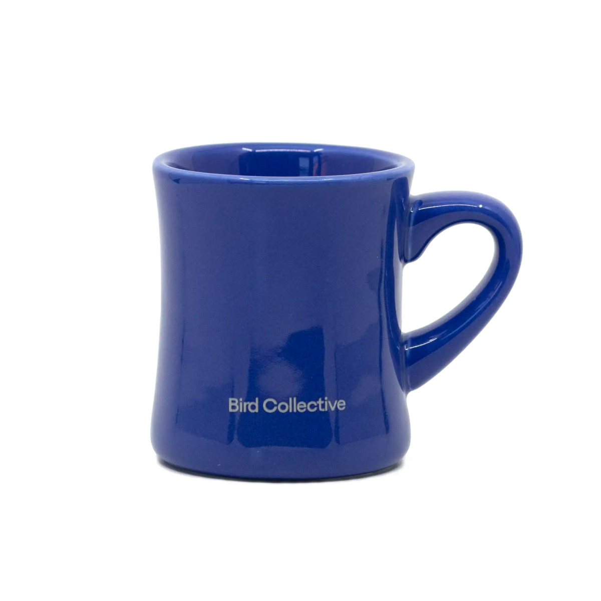 Blue mug with 'Bird Collective' branding on a white background