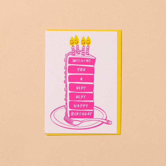 Birthday card with pink cake illustration and candles on a beige background