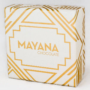 Mayana Chocolate packaging with gold geometric design on a white background