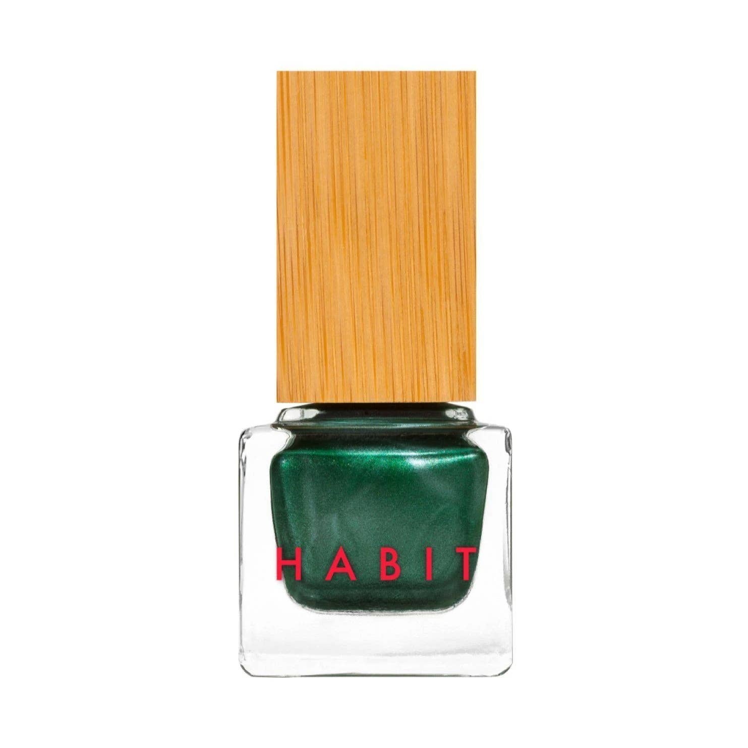 Green nail polish with a wooden cap on a white background