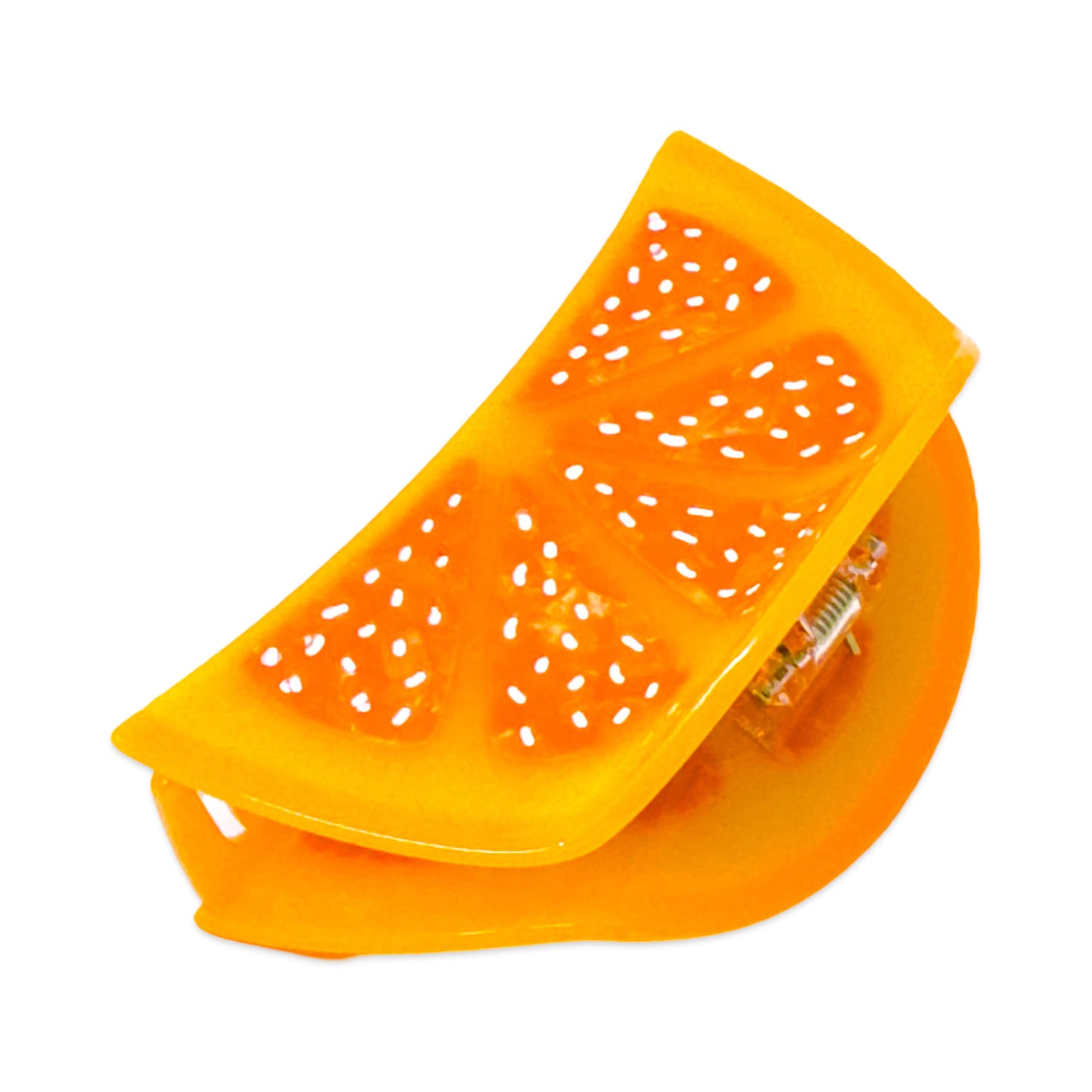 Orange plastic fruit peeler on a white background