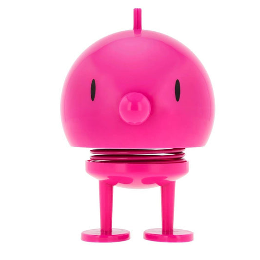 Pink robot toy on a white background