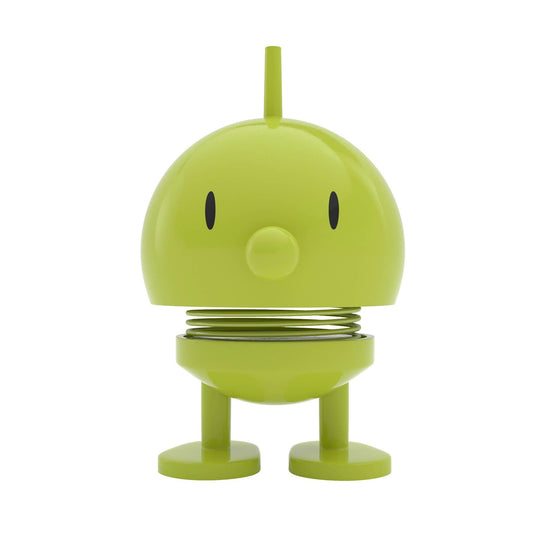 Green robot toy on a white background