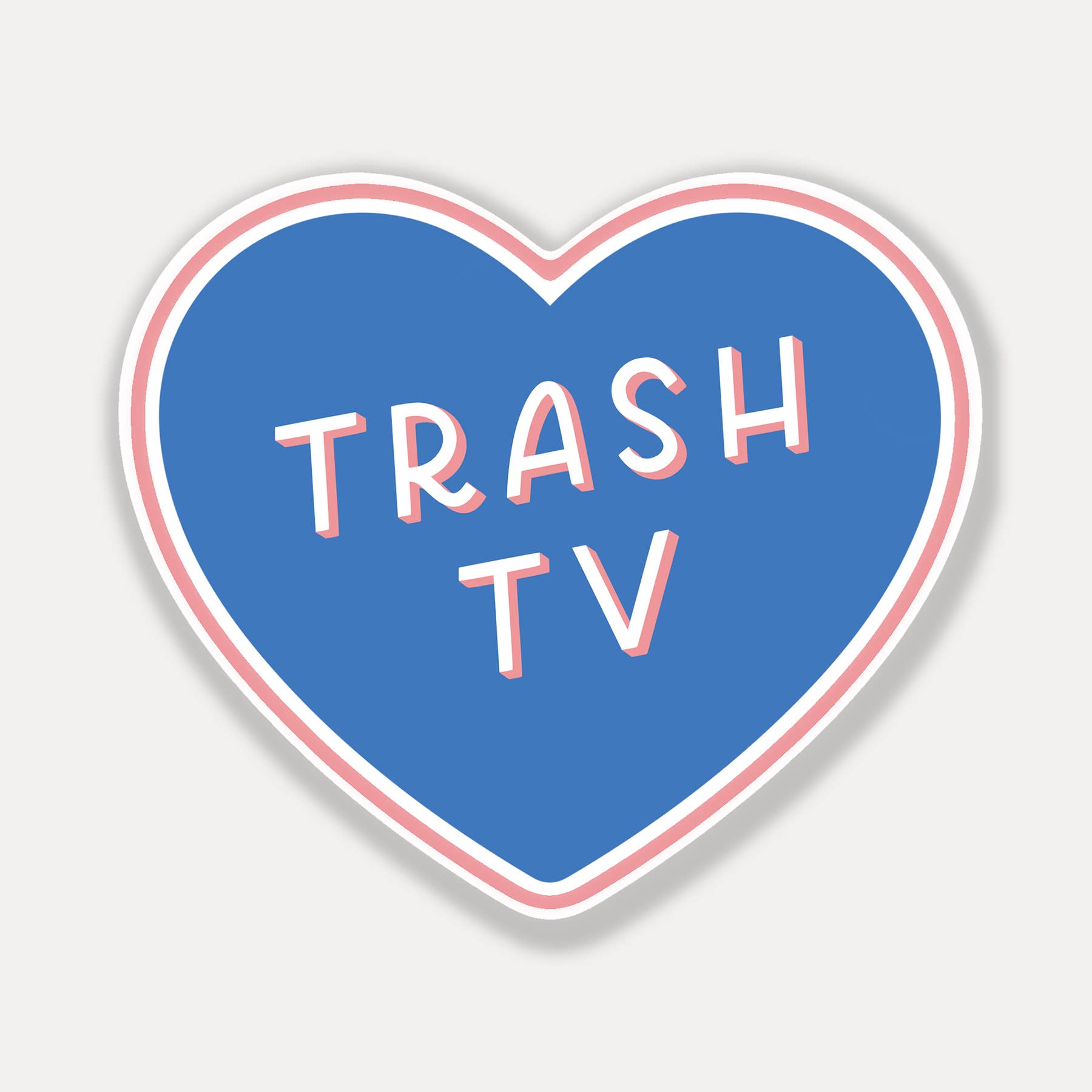 Heart-shaped sticker with 'TRASH TV' text on a light gray background