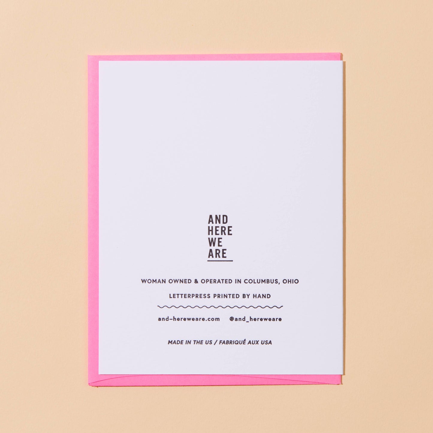 White card with black text on a beige background