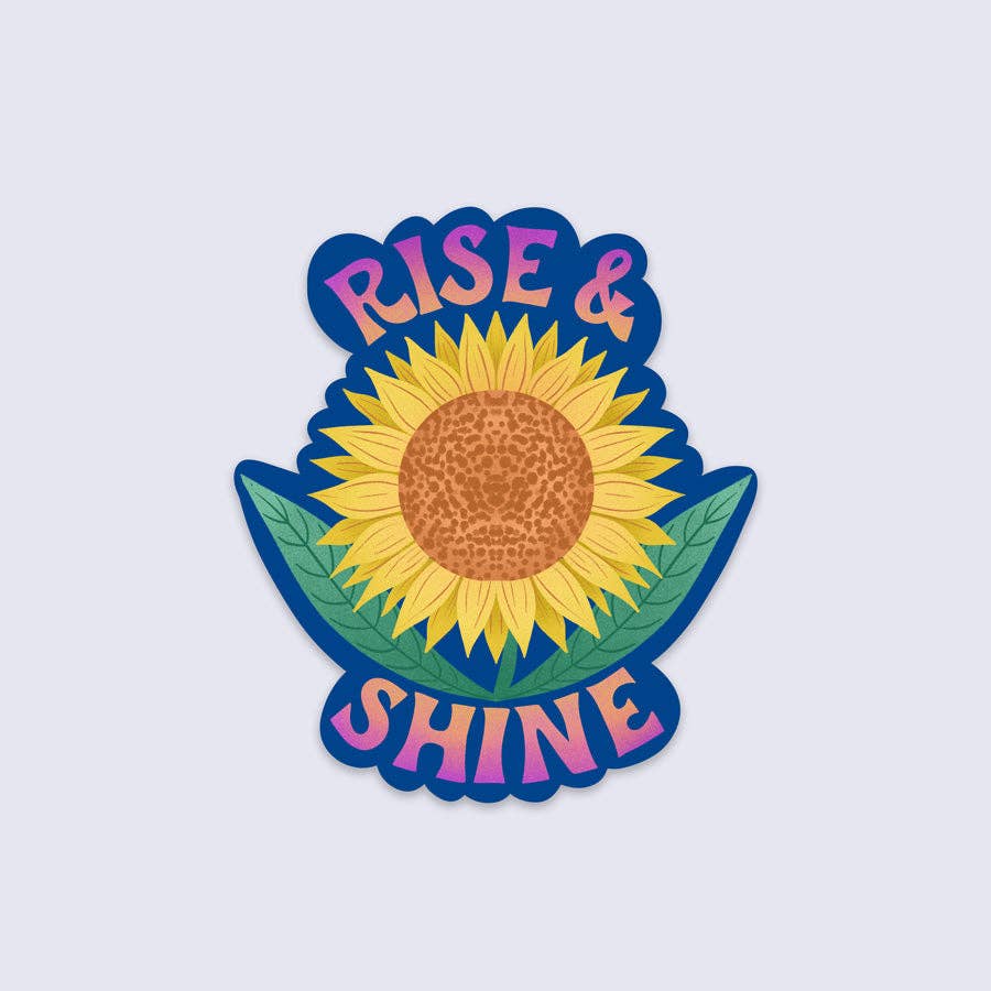 Sticker with sunflower design and 'Rise & Shine' text on a light blue background
