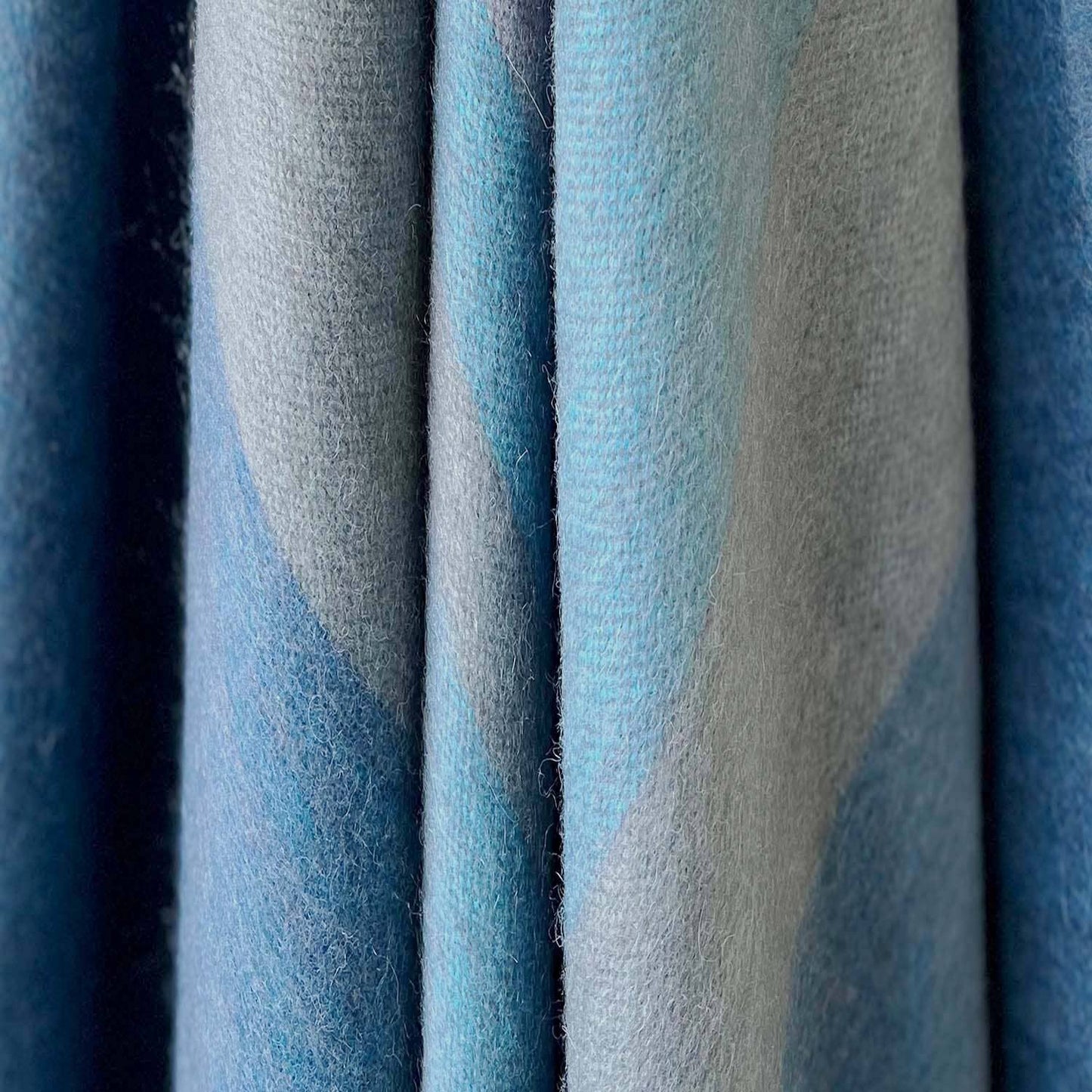 Close-up of blue and gray fabric swatches