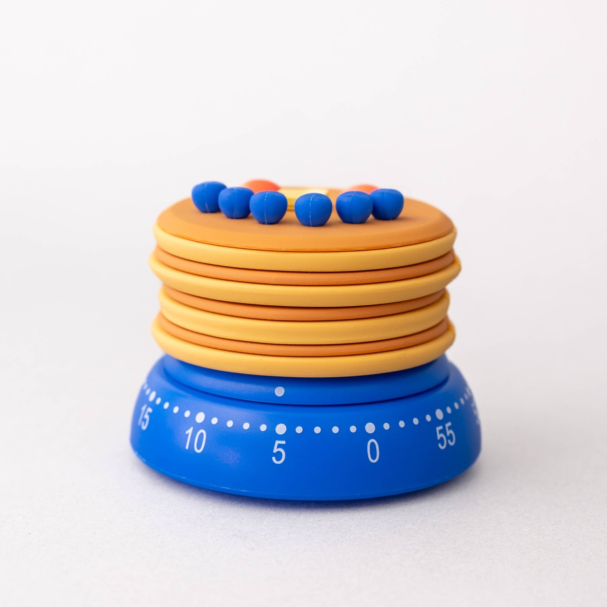 Colorful kitchen timer with blue and orange bands on a white background
