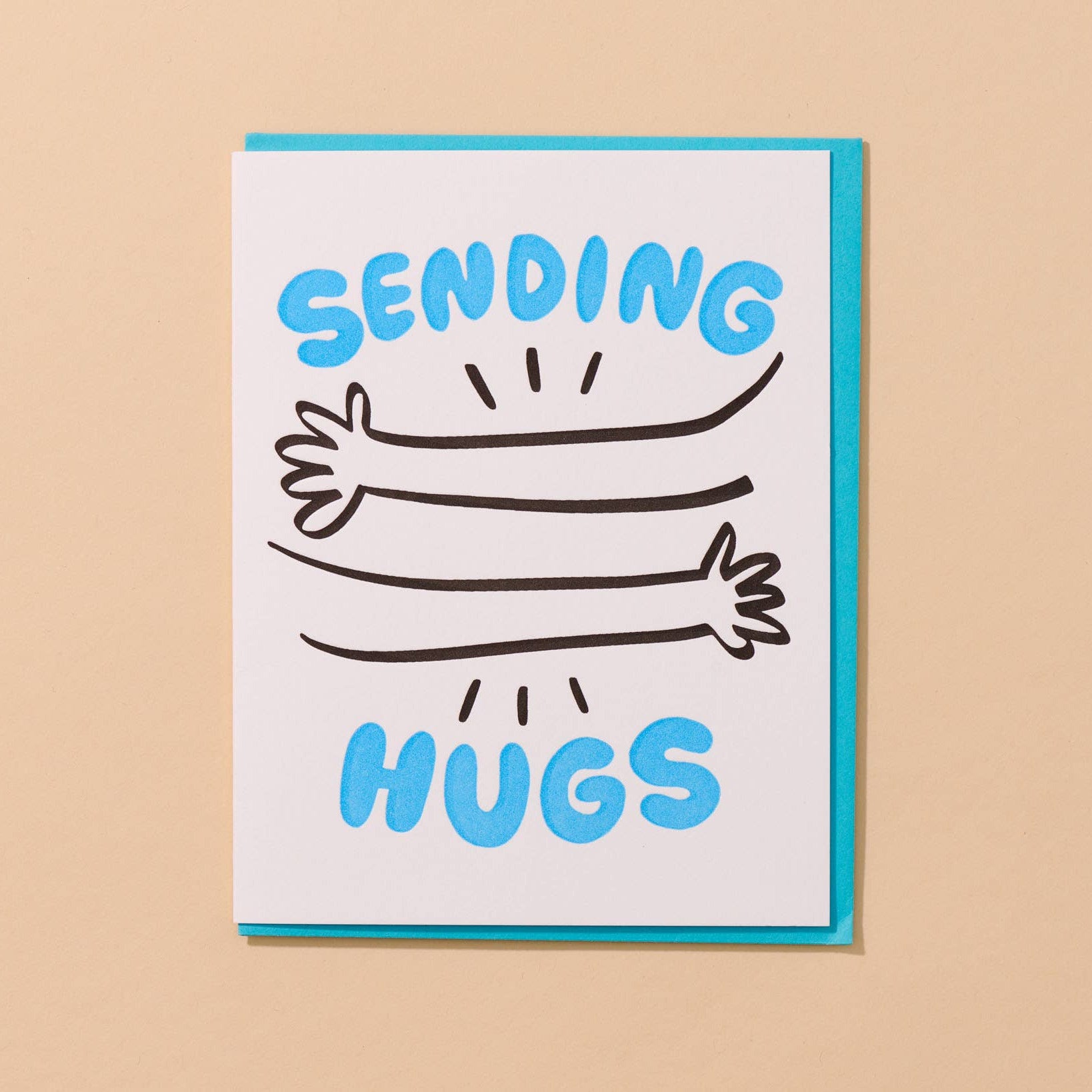 Card with 'Sending Hugs' text and hug illustrations on a beige background