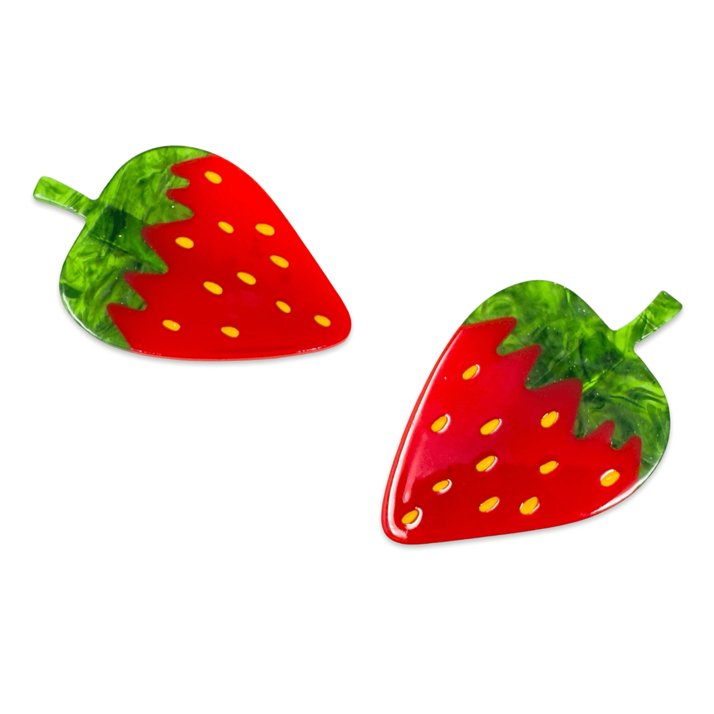 Strawberry-shaped earrings on a white background