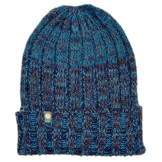 Blue and black knitted beanie on a white background