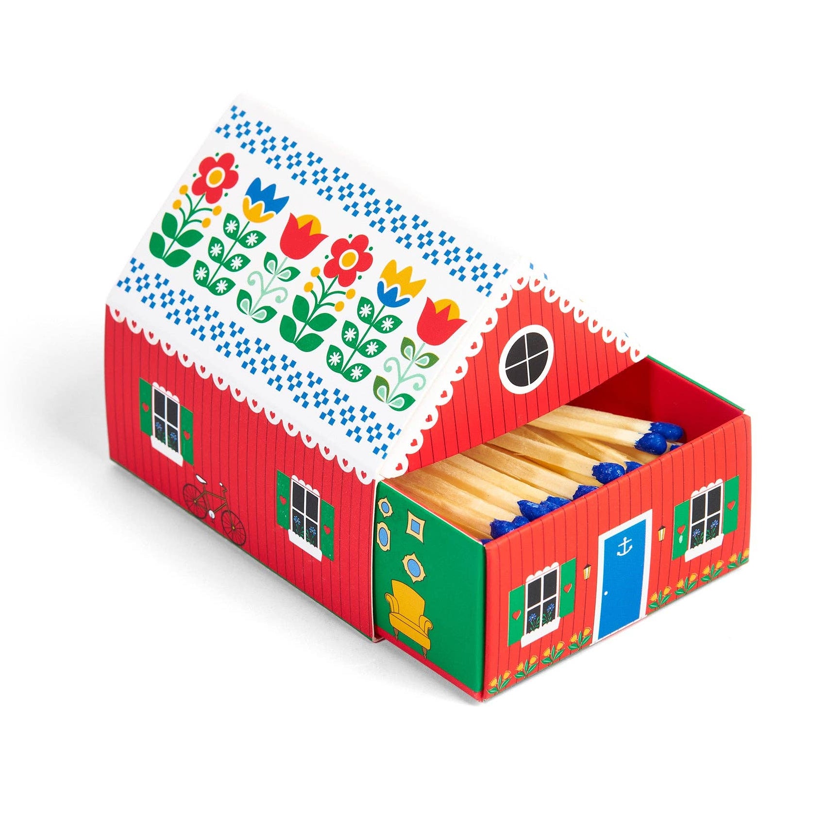 Colorful toy house with a red roof and floral design on a white background