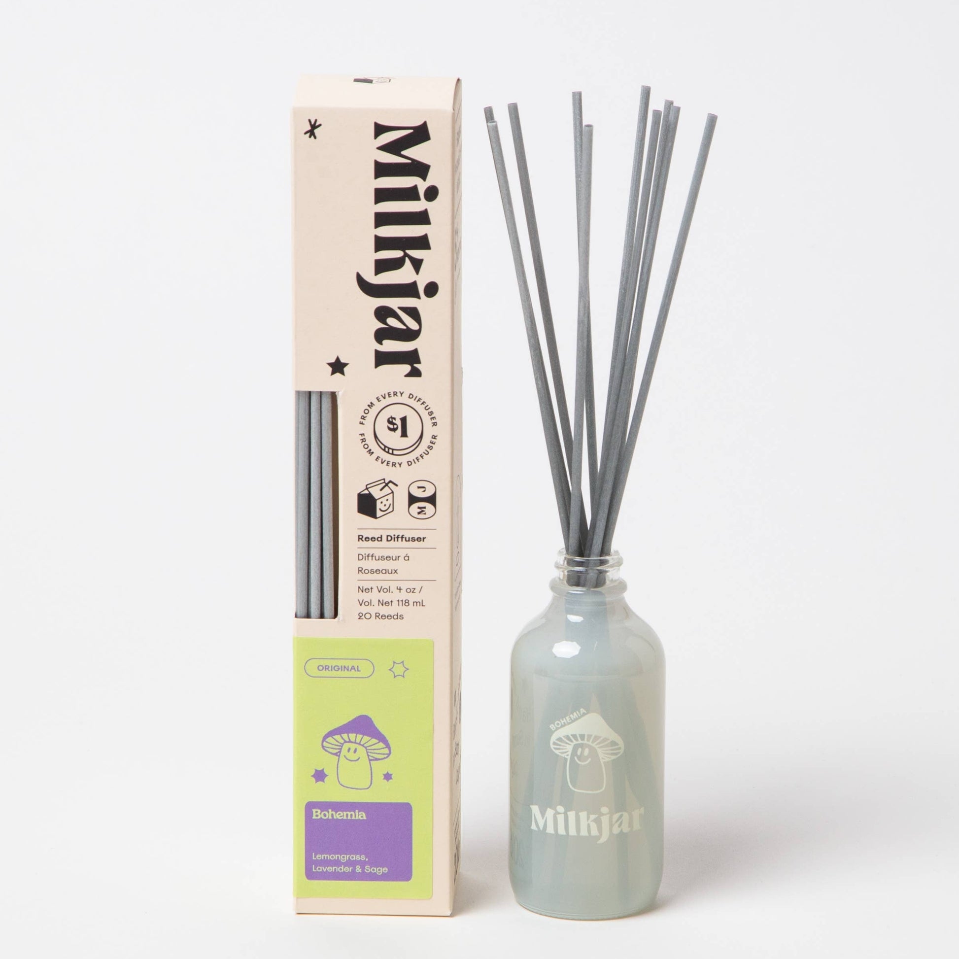 Milkjar diffuser bottle with sticks and packaging on a white background