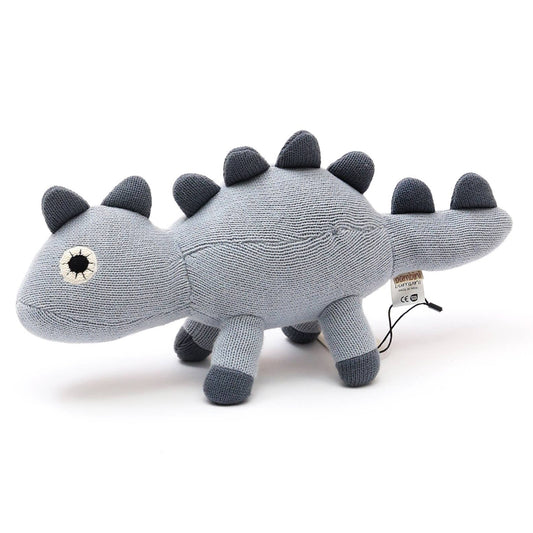 Gray dinosaur toy with black spikes on a white background