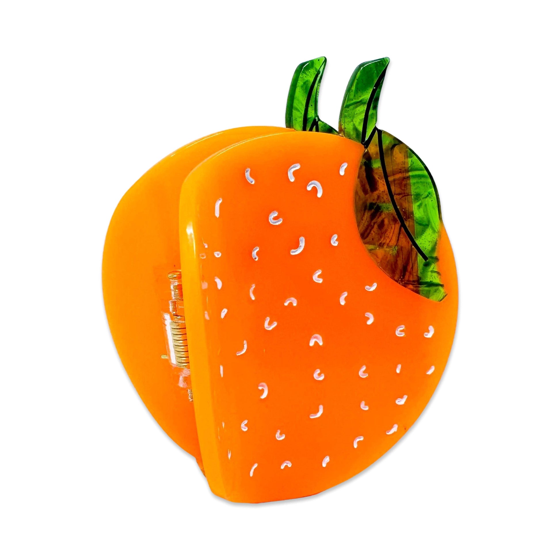 Orange with green leaves on a white background