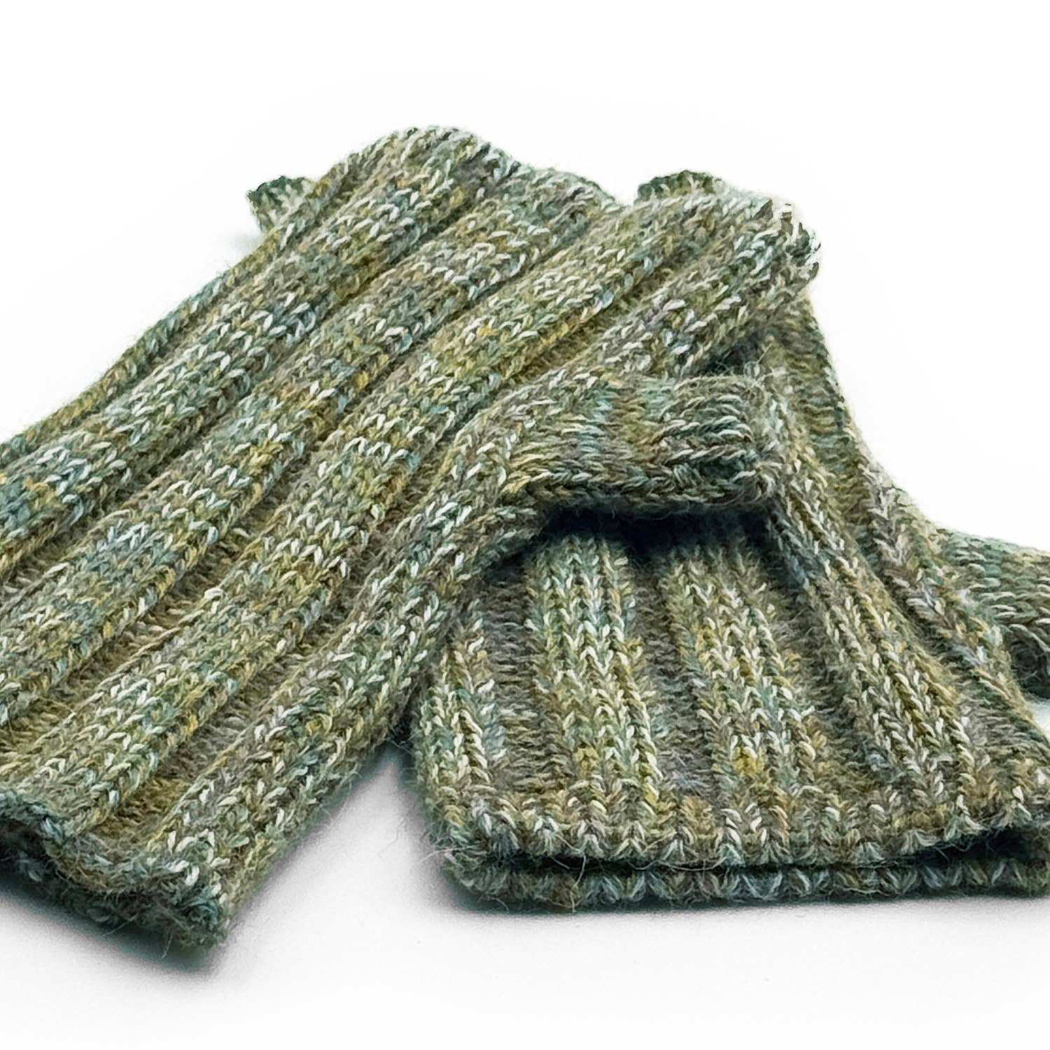 Pair of green knitted fingerless gloves on a white background