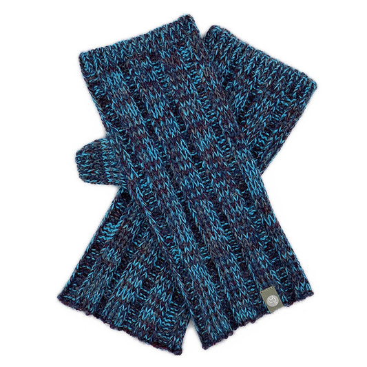 Pair of blue and black knitted fingerless gloves on a white background