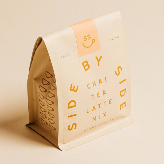 Side by Side Chai Tea Latte Mix packaging on a beige background