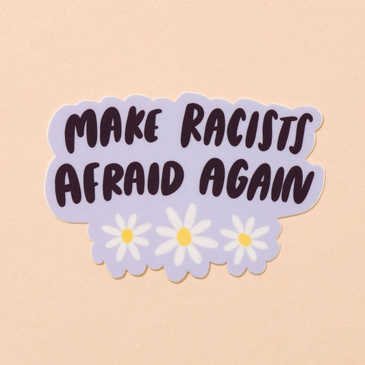 Sticker with 'MAKE RACISTS AFRAID AGAIN' text on a beige background