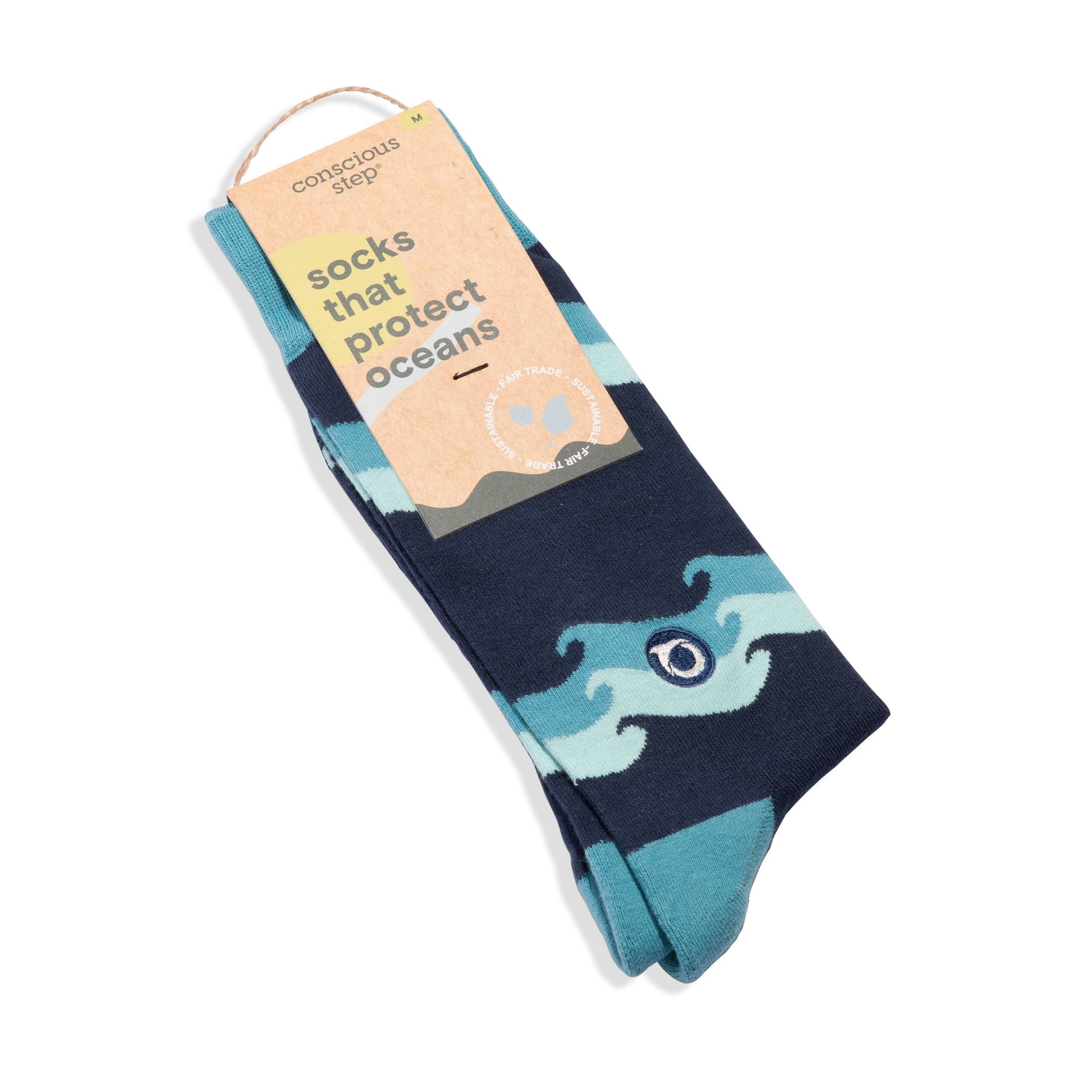 Navy sock with green wave design on a white background