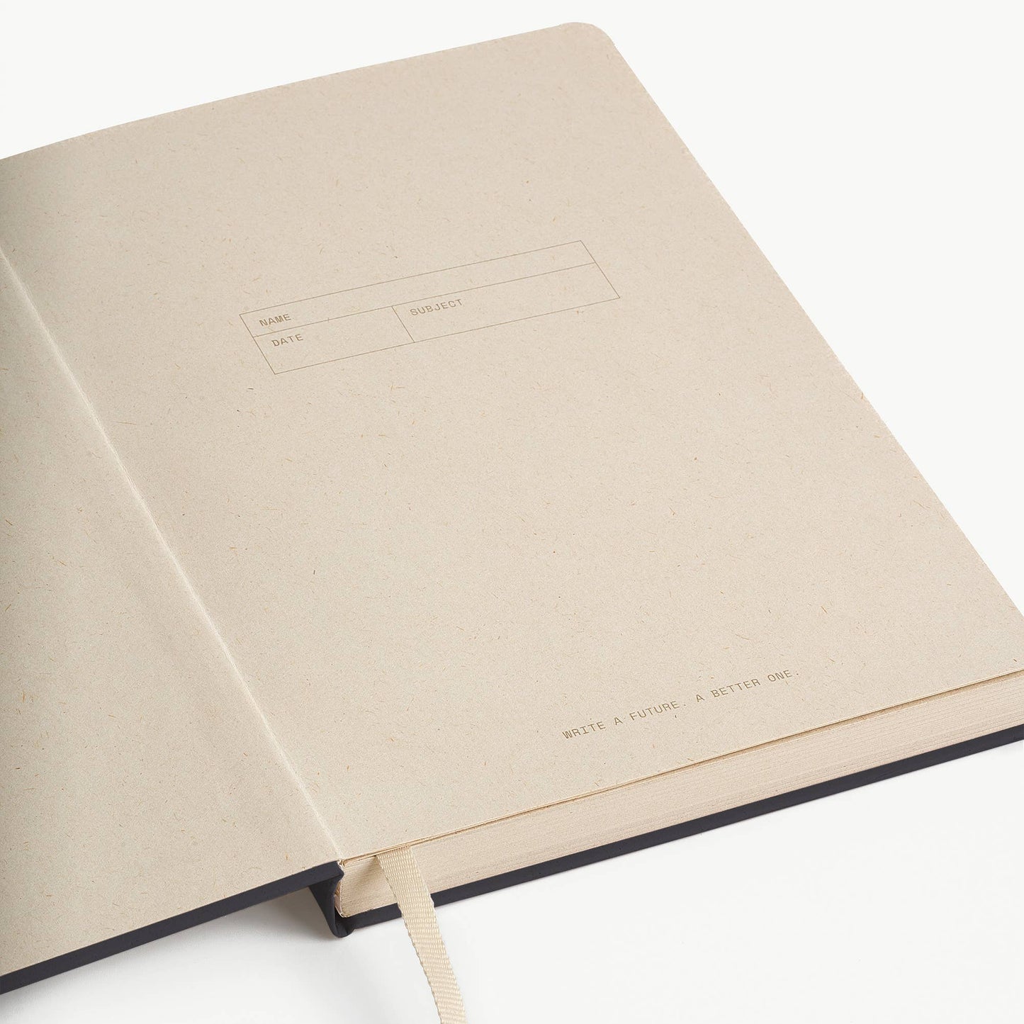 Beige notebook with a minimalist design on a white background