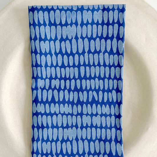 Blue patterned napkin on a white plate