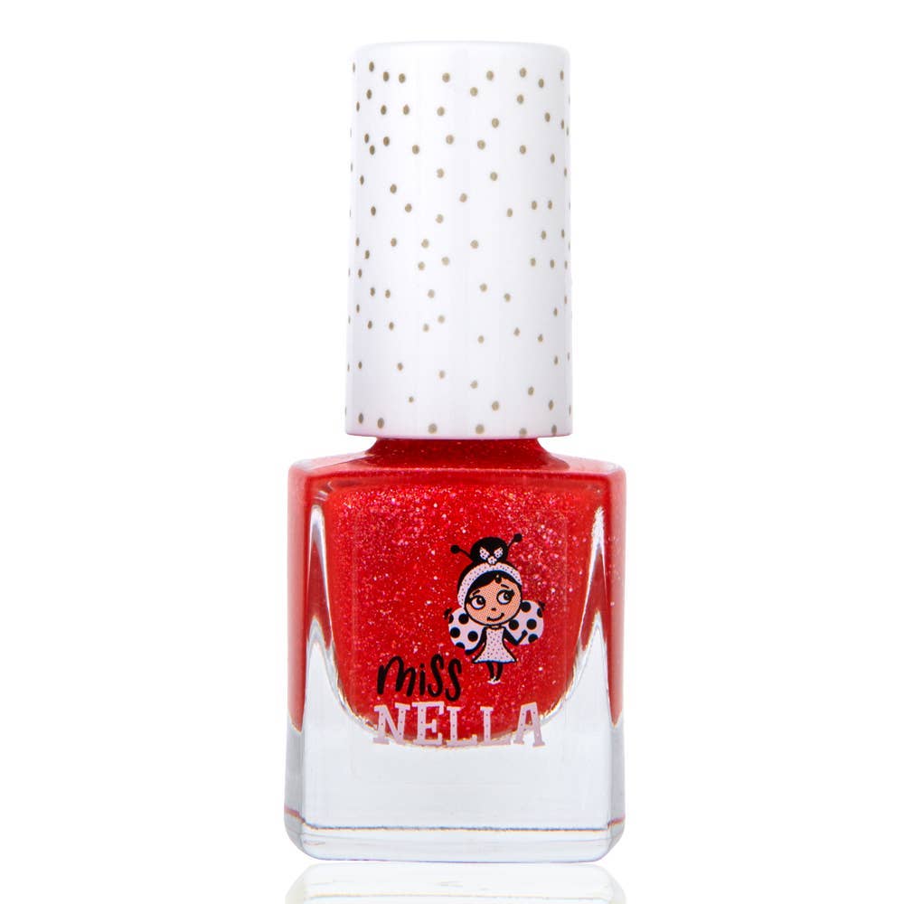 Red nail polish bottle with a white cap featuring gold polka dots, on a white background.