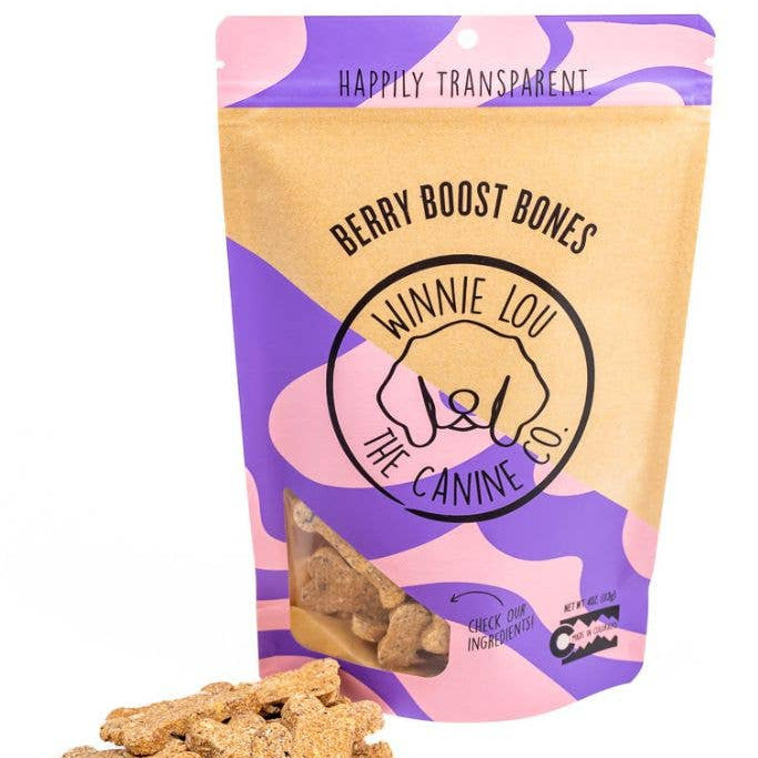 Bag of 'Berry Boost Bones' dog treats with visible treats on a white background