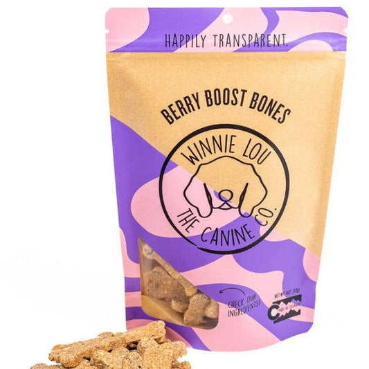 Bag of 'Berry Boost Bones' dog treats with visible treats on a white background